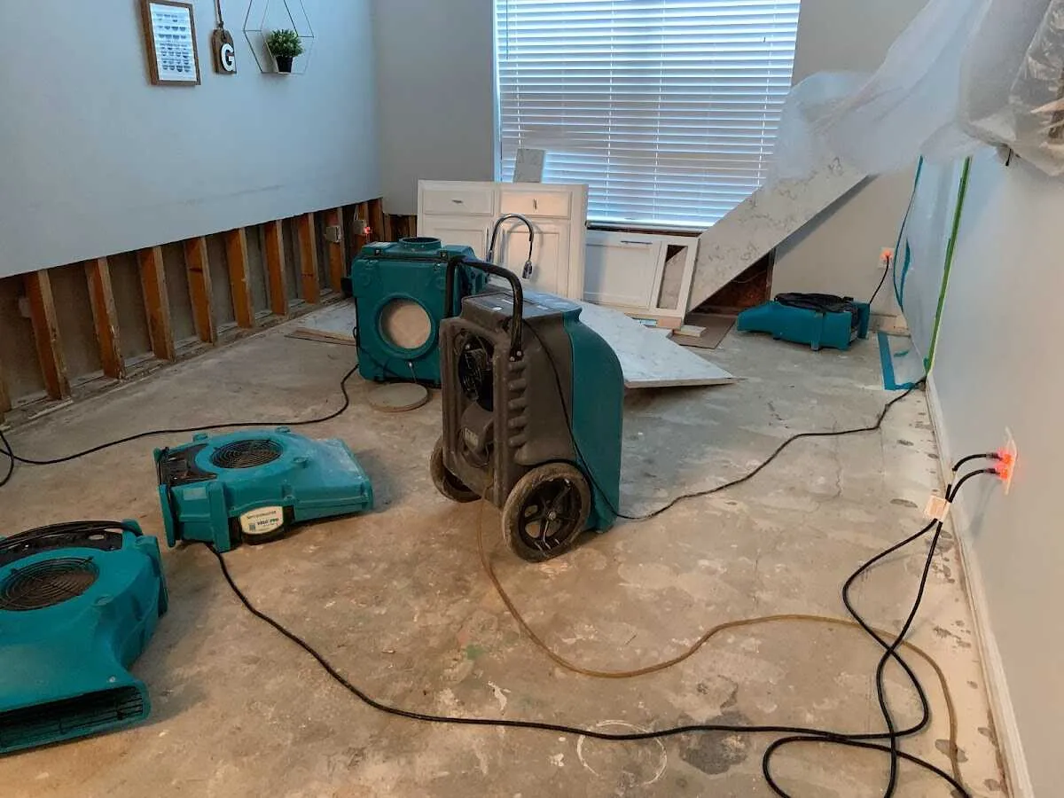 Dehumidifier in flood-cut room for Water Damage Restoration in Four Square Mile